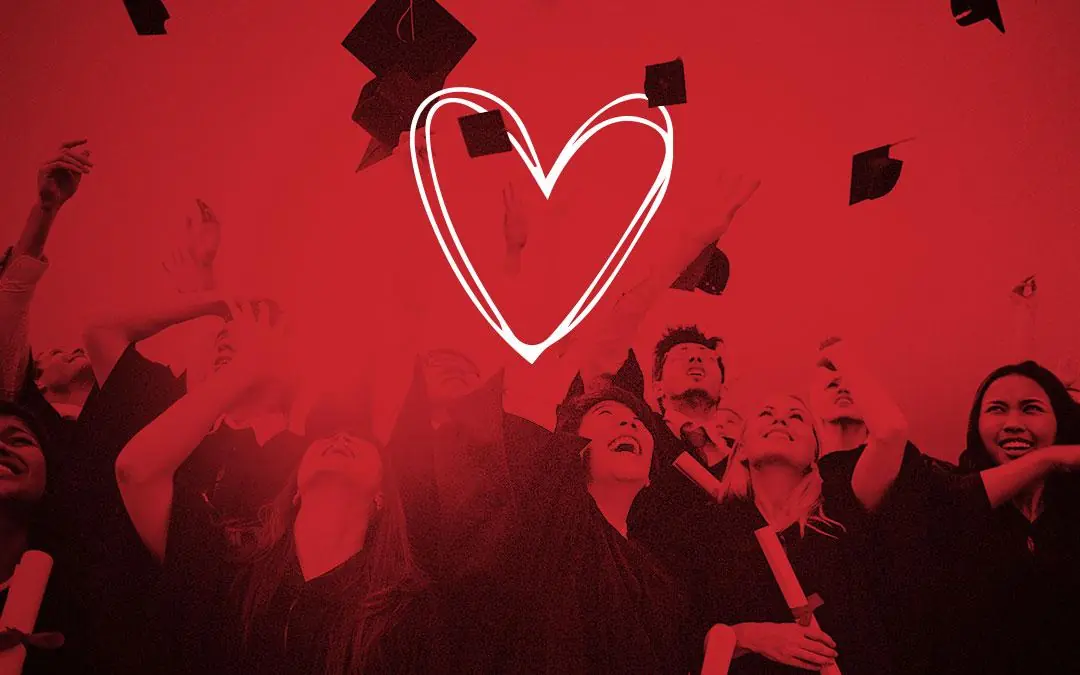 scholarship-post graduates throwing hats into the air